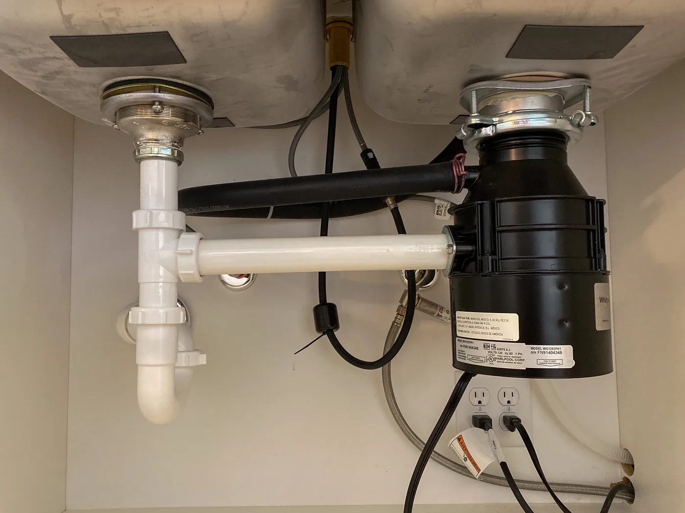 Garbage Disposal Leak in Sharpstown, Texas